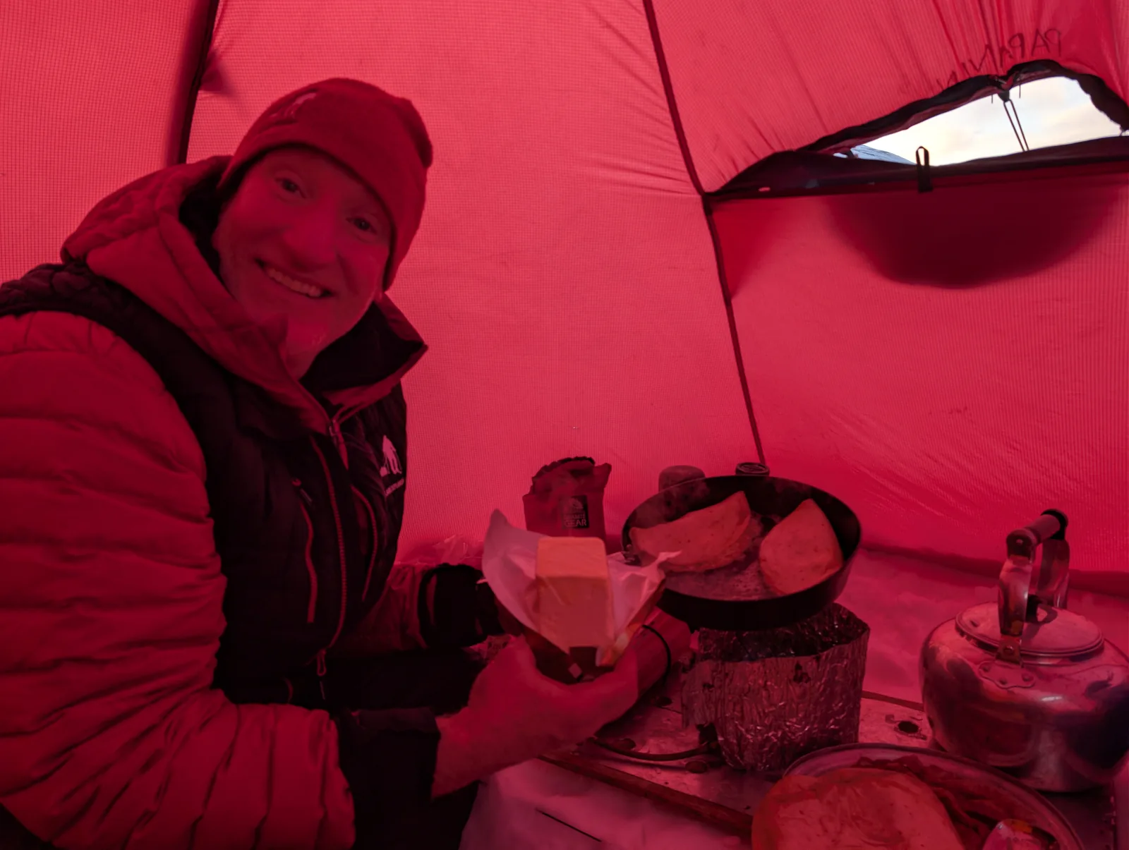 Keith making quesadillas in the tent