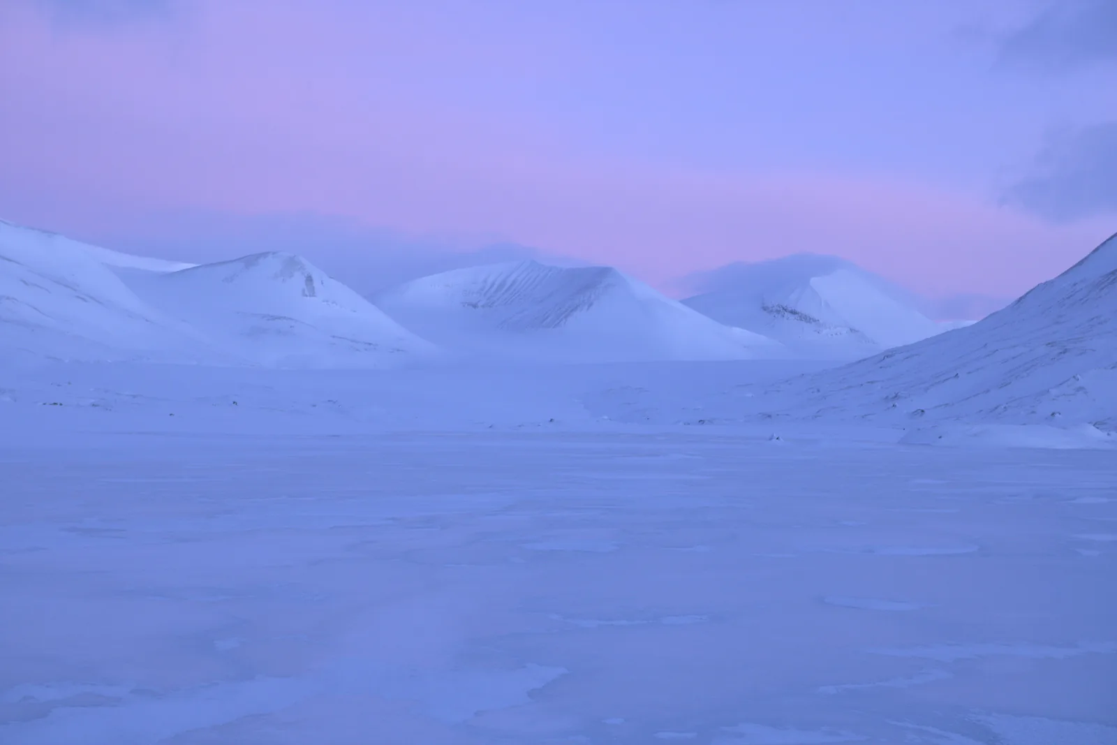 Alpenglow over the frozen valley