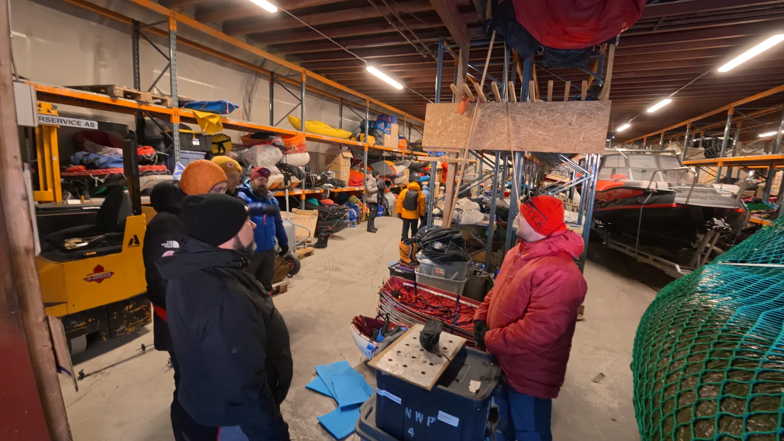 Loading the pulks in the hangar the night before